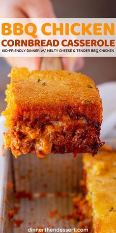 a person holding up a piece of cornbread casserole