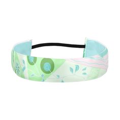 a headband with an abstract design on the front and side, in pastel colors