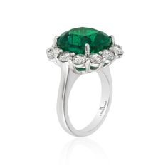 Andreoli Emerald And Diamond Ring features: 3.20ct Diamond 10.76ct Emerald Zambian Certified 17.66g Platinum Made In Italy Luxury Formal Emerald Ring With Halo Design, Luxury Emerald Ring With Halo Design, Luxury Platinum Emerald Ring With Halo Design, Emerald And Diamond Ring, To Miss, Diamond Ring, Platinum, Emerald, In Italy