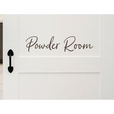 a door with the word powder room written on it