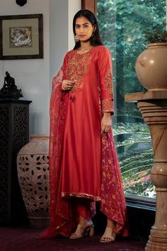 Red asymmetric kurta with floral printed side panel embellished by sequins and swirl thread embroidery. Comes with dhoti pant and a printed dupatta. - Aza Fashions Red Dabka Embroidered Dupatta For Festivals, Red Dupatta With Dabka For Festivals, Red Dabka Dupatta For Festivals, Traditional Red Sets With Dabka Detailing, Red Chanderi Palazzo Set With Dabka Detail, Red Chanderi Salwar Kameez With Dabka, Red Raw Silk Dupatta With Dabka Detail, Red Raw Silk Dupatta With Dabka, Red Dupatta With Dabka In Traditional Drape