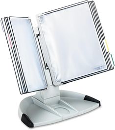 a white desk top computer monitor sitting on top of a metal stand with an open cover over the screen