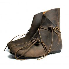 Brown Leather Viking Boots with Leather Toggles | Medieval Shoes Material: Genuine Leather with rubber soles.Color: BrownMen's US Sizes: 5.5 through 15.5 (EU Sizes: 36-50) Worldwide shipping available!Custom made to order: Please allow up to 1-3 weeks before item ships. Share: Viking Town, Viking Boots, Medieval Shoes, Horns Decor, Beard Beads, Bead Hair Accessories, Viking Clothing, Viking Style, Medieval Clothing