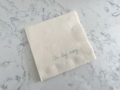 25 One Day Away Rehearsal Dinner Wedding Custom Cocktail Napkins Ivory Napkins Dusty Blue ink 3 Ply Paper beverage napkins 5x5 by CharlestonCharms on Etsy Cocktail Style Rehearsal Dinner, Rehearsal Dinner Cocktail Napkins, Rustic Wedding Rehearsal Dinner Decor, Boat Rehearsal Dinner, Rehearsal Dinner Tablescapes, Blue And White Rehearsal Dinner, Coastal Rehearsal Dinner, Rehearsal Dinner Table Decorations, Embroidered Wedding Napkins