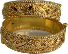 Traditional Yellow Gold Bangle With Intricate Design, Elegant 22k Gold Wedding Bangle, Luxury Gold Bangle For Wedding, Luxury 22k Gold Hand Set Bangle, Exquisite Formal Gold Bangle, Traditional Formal Bangle With Elegant Design, Traditional Yellow Gold Bracelets For Anniversary, Traditional Yellow Gold Anniversary Bracelet, Elegant Yellow Gold Bangle For Festivals