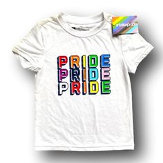 Children’s Pride T-Shirt. Kids Size 4t. #Takepride Brand. 60% Cotton, 40% Recycled Polyester. Brand New With Tags Attached. Perfect For Gay Pride Parades, Lgbtqia+ Events, & Pride Month Festivities! White Pre-shrunk Top For Pride, Unisex White T-shirt For Playtime, Rainbow Print Graphic Tee For Pride, Graphic Tee With Rainbow Print For Pride, White Graphic Print Top For Pride, Multicolor Letter Print Shirt, Playful White Top With Rainbow Print, White Pre-shrunk T-shirt For Pride, White Rainbow Print T-shirt For Pride