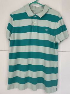 Timberland men’s short sleeve striped polo shirt green size large. Condition is "Pre-owned". Shipped with USPS First Class. Summer Polo Shirt With Horizontal Stripes, Summer Horizontal Stripe Polo Shirt, Summer Short Sleeve Horizontal Stripe Polo Shirt, Casual Short Sleeve Polo Shirt With Horizontal Stripes, Casual Horizontal Stripe Short Sleeve Polo Shirt, Casual Short Sleeve Polo Shirt With Stripes, Casual Short Sleeve Striped Polo Shirt, Green Polo Shirt With Striped Collar And Short Sleeves, Green Short Sleeve Polo Shirt With Striped Collar