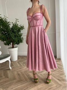 Details: -Sequined velvet designer fabric -Pink sands color -Tea length style with boned bodice and decorative straps Baby Pink Prom Dresses, Purple Evening Gowns, Midi Prom Dress, Teuta Matoshi, Night Club Dress, Spaghetti Strap Prom Dress, Mini Dress Fashion, Pink Gowns, Pink Prom Dresses