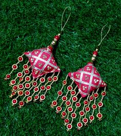 Red Latkan for blous Lehenga HandBags Hangings Dupatta Decoration Bridal Wedding dress for Women pair Thread Fringe Beaded latkan of 2 pcs Designer's Den Tassels For Women wedding Handmade Hanging bridal heavy Tassels Lehange Fancy Beautiful Pair of Latkans & Brooch Accessory For You Decorative Products. In Indian These Latkans Are Normally Used as The Accessory For Lengha & Sari Blouse On The Back, But These Can Be Used in Many Other Ways to Metal & Pearl scan be used at an door. Muzaffarpur is Traditional Party Wear With Latkans, Lehenga With Latkans For Festivals And Celebrations, Pink Traditional Wear With Latkans For Puja, Traditional Wear With Latkans For Diwali Party, Diwali Party Traditional Wear With Latkans, Red Traditional Wear With Latkans For Festivals, Festive Traditional Wear With Latkans For Party, Red Festive Traditional Wear With Latkans, Choli With Latkans For Festivals