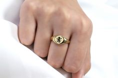 Embrace your royal heritage with our Custom Heraldic Royal Lion Round Gold Signet Ring. Featuring a round design that elegantly frames a deeply engraved royal lion, this piece is a nod to the noble qualities of leadership and valor. Each detail of the heraldic lion is rendered with precision, symbolizing strength and nobility across cultures and time. Made from the finest gold, this ring is not only a statement of personal style but also a connection to a storied past. Ideal for aficionados of h Vintage Tarnish-resistant Signet Ring, Vintage Engraved Round Ring, Tarnish Resistant, Luxury Engraved Ring With Classic Design, Gold Engraved Ring With Classic Design, Classic Engraved Gold Ring For Gift, Timeless Engraved Ring Tarnish Resistant, Timeless Engraved Tarnish-resistant Ring, Gold Engraved Ring With Classic Design For Gift, Timeless Tarnish Resistant Engraved Ring