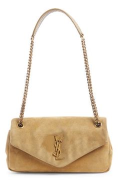 An iconic YSL insignia brands the flap of this calfskin-suede bag in a softly structured silhouette with a pull-through strap for carrying versatility. Magnetic-snap flap closure Pull-through chain strap Interior zip pocket Leather Made in Italy Designer Handbags Chic Suede Shoulder Bag With Magnetic Closure, Elegant Suede Shoulder Bag With Palladium Hardware, Elegant Suede Shoulder Bag With Gold-tone Hardware, Elegant Shoulder Bag With Suede Lining, Luxury Formal Bag With Suede Lining, Luxury Suede Shoulder Bag For Formal Occasions, Designer Suede Shoulder Bag For Formal Occasions, Luxury Suede Bags For Formal Occasions, Luxury Suede Bags With Gold-tone Hardware