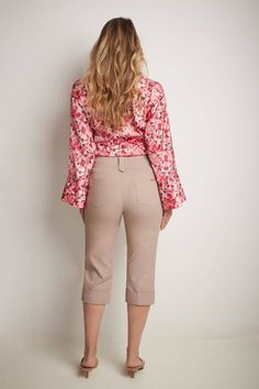 Everyone knows that you’re the queen of summer fashion, but it’s time to raise the bar. Challenge your personal best by adding these classic capris with cuffed hem to your wardrobe. With their relaxed fit leg t, they are an excellent choice for long days at work or on the beach. Not to forget the real pockets and metallic accents at the waist that make them dressy and functional at the same time. Belt loops and tonal topstitching throughout Fixed cuffs Real front pockets, back patch pockets Wide Fitted Spring Capris With Cropped Legs, Chic Spring Pants With Cuffed Ankles, Fitted Capri Length Pants For Spring, Summer Cropped Leg Capris For A Day Out, Fitted Summer Pants With Button Cuffs, Fitted Spring Capris Short Length, Chic Summer Capris With Relaxed Fit, Cotton Capris For Spring Workwear, Trendy Spring Pants With Cuffed Ankles