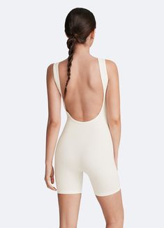 Sculpt and smooth with our Waist-Contouring Bodysuit. Designed to enhance your natural shape, this bodysuit provides gentle compression for a flattering fit in standard and plus size options. Whether layered or worn on its own, it’s the perfect mix of style and support. Second-skin Athleisure Bodysuit For Loungewear, Summer Backless Athleisure Bodysuit, Summer Athleisure Backless Bodysuit, Second-skin Bodysuit For Loungewear In Athleisure Style, Chic Summer Workout Bodysuit, Compressive Summer Bodysuit For Loungewear, Fitted Backless Summer Activewear, Fitted Shapewear Activewear For Summer, White Athleisure Bodysuit For Summer