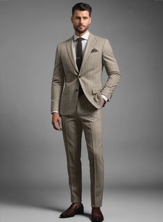 Experience the refined charm and pleasure of dressing in our exquisite Italian Light Brown Herringbone Flannel Suit, tailored to be as exceptional as you are. Made from premium-grade wool, this suit boasts a light brown shade that exudes warmth and approachability, while its herringbone design elevates you to the epitome of elegance with a subtle touch of contemporary flair. Whether you're attending a formal event, a business meeting, or a special celebration, this suit is your ultimate go-to choice for a distinguished and polished look.  Look features a 2 button jacket with notch lapels,  horn brown  buttons, single vent, three cuff buttons and two welted back pockets on trousers. 
  Click 'Customize Now' to modify the look if needed.     
  
Lining: Viscose. Elegant Beige Tuxedo With Notch Lapel, Elegant Beige Tuxedo For Formal Occasions, Elegant Beige Formal Tuxedo, Luxury Double Breasted Suit With Long Sleeves, Luxury Beige Tuxedo For Business, Classic Beige Semi-formal Sets, Luxury Beige Business Tuxedo, Tailored Beige Suit In Suiting Fabric, Tailored Beige Suits In Suiting Fabric