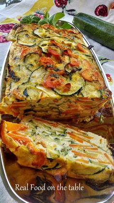 zucchini and tomato frittata on a platter