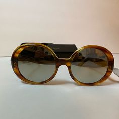 Nwt Excellent Condition Never Been Worn Comes With Case And Cleaning Cloth Elegant Brown Sunglasses With Round Frame, Elegant Brown Round Frame Sunglasses, Elegant Tortoiseshell Sunglasses With Mirrored Lenses, Elegant Brown Oval Sunglasses, Jackie O Sunglasses, Celine Accessories, Round Frames, Tortoise Sunglasses, Pilot Sunglasses