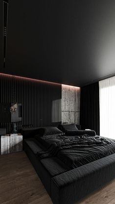 a large bed sitting in the middle of a room