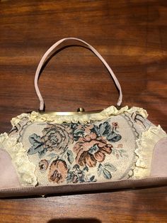 Vintage brocade lace patchwork hand bag purse Vintage styled bag Nice brocade florals with golden threads 6 in x 13 in 18 in wrist strap All shipped free in the US Please check out our THOUSANDS of great reviews Formal Tapestry Bags, Vintage Tapestry Pouch Bag, Formal Embroidered Tapestry Bag, Gold Tapestry Rectangular Bag, Vintage Beige Tapestry Bag, Vintage Cream Handheld Bag, Vintage Fabric Shoulder Bag For Daily Use, Vintage Fabric Bags For Everyday Use, Vintage Tapestry Bag With Detachable Handle