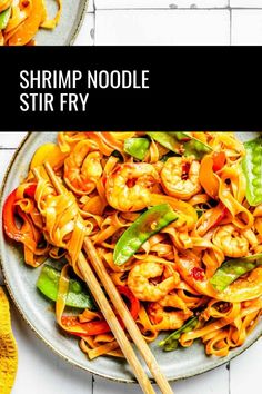 shrimp noodle stir fry with chopsticks on the side