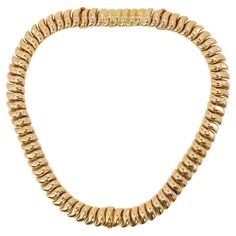 A Boucheron "Ondule" model necklace consisting of 2 bracelets and a smaller detachable motif in 18Kt (750°/°°) yellow gold. The necklace can be transformed into two bracelets. French work from the 1940s. Signed Boucheron Paris on each. Poinçon de maître by Robert Pouget. Necklace length: 40 cm Length of bracelets: 18.5 cm Length of detachable motif: 5.2 cm Gross weight: 131.58 grams Boucheron Necklace, Antique Diamond, Vintage Designer, Link Necklace, Diamond Gemstone, Necklace Bracelet, Vintage Designs, Diamond Jewelry, Necklaces Bracelets