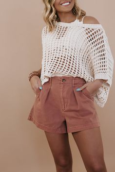 Our High Waist Button Shorts, a must-have piece for style and comfort this spring. Perfect for those seeking a vintage aesthetic for spring 2024. Pair with a cropped knit top for a laid-back yet stylish look that embodies the vibes of spring fashion. High waist shorts Button shorts Vintage Spring aesthetic Elastic waistband Button + Zip closure Belt loops Functional front pockets NON functional back pockets 100% cotton Imported Fit: RUN LARGE! Size down before sizing up! Small (4-6) Medium (8-10 Vintage Spring Aesthetic, Cropped Knit Top, Button Shorts, Festival Shop, Everyday Chic, High Waist Shorts, Vintage Spring, Spring Aesthetic, Knit Crop Top