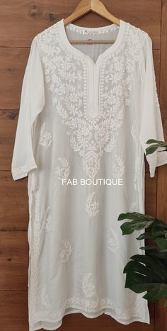 Description ▪ Kurti Fabric: Modal ▪ Kurti Length: 44-46 Inches ▪ Sleeves: 3/4 Sleeves ▪ Style: Straight Kurti ▪ Occasions: Party Wear, Office Wear, Festive Wear ▪ Garment Care: Hand Wash Only ▪ Price Includes: 1x Kurti White Bollywood Kaftan For Festive Occasions, Festive Straight Kurta Kaftan With Chikankari Embroidery, Designer White Blouse Piece With Chikankari Embroidery, Festive Wedding Kaftan With Chikankari Embroidery, Festive White Bollywood Kaftan, Traditional Chanderi Kaftan For Summer, Festive Kaftan With Chikankari Embroidery, Festive Chikankari Embroidered Georgette Kaftan, Festive Chikankari Embroidery Kaftan In Georgette