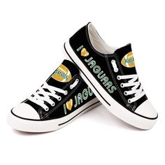 Jacksonville Jaguars Canvas Shoes Black Shoes “I Jaguars”. Discover the perfect blend of nature and style with these sneakers adorned with a vibrant dinosaur print and floral patterns. Designed for comfort and flair, they're a bold choice for the fashion-forward individual. #jacksonville jaguars #Shoes #Snorider Southern University Jaguars, Southern University, Jacksonville Jaguars, Trendy Sneakers, New Orleans Saints, Black Sneakers, Classic Silhouette, Dinosaur Print, Custom Shoes