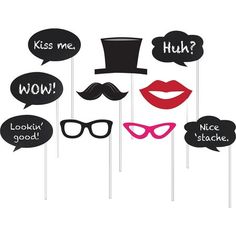 photo booth props that say kiss me, wow, lookin'good and mustaches