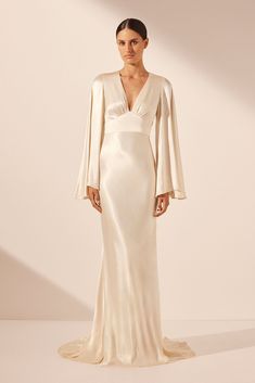 Slick Wedding Dresses, Satin White Maxi Dress, Cream Long Sleeve Silk Dress, Cream Silk Maxi Length Gown, Elegant Long Sleeve Cream Maxi Dress, Cream Long Sleeve Silk Midi Dress, Wedding Dresses For Over 50, Luxury Cream Satin Maxi Dress, Kimono Wedding Dress