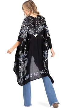 Printed lightweight cardigan, with split on sides and an open front style with an asymmetrical length. Dropped?sleeves and sheer fabric. Looks great layered over casual outfits. CARE | Hand Wash ColdCONTENTS | 100% ViscoseMEASUREMENTS | 38"/96 cm Top to Bottom (Size O/S) MODEL | 5'8 - wearing O/SIMPORTED Casual Wrap Cardigan For Beach Cover-up, Chic Spring Layering Cover-up, Summer V-neck Beach Cover-up Outerwear, Oversized Spring Tunic Cover-up, Casual Black V-neck Kimono, Open Front Layering Cover-up, Flowy Open Front Top For Spring, Oversized Open Front Vacation Top, Oversized Open Front Top For Vacation