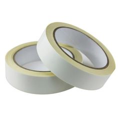 two rolls of white tape on a white background