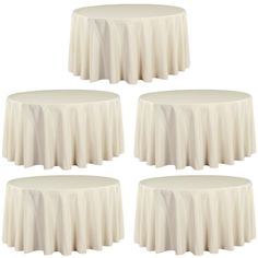 four round tables with white tablecloths on each side and one in the middle