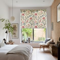 a bedroom with a bed, chair and window