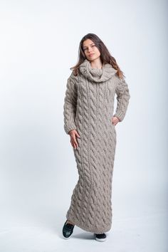 Beige Sweater Dress, Oversized Wool Dress, Extravagant Wool Dress  DETAILS  *Material -Premium Wool Natural Yarn ,100% Eco Yarn ,no colored *100 % Handmade and Homemade locally in Bulgaria /EU / by our own employed knitters. We ensure excellent working conditions- faire paid , free health insurance and 20 days annual paid vacation..     / Made in a smoke-free and pet friendly environment/ *Style - cables *Color - beige     / Product colour may slightly vary due to photographic lighting sources o Hand-knitted Long Sleeve Dress For Fall, Hand Knitted Long Sleeve Dress For Fall, Cozy Knitted Beige Dresses, Cozy Long Knitted Dress, Winter Long Chunky Knit Dress, Long Chunky Knit Winter Dress, Long Chunky Knit Sweater Dress, Oversized Long Knit Dress, Long Oversized Knit Dress