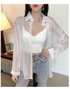 Long Sleeve Transparent Sexy Blouse Shirt – Tomscloth White Sheer Outfit, White Sheer Shirt Outfit, Sheer Long Sleeve Shirt For Party, Sheer Long Sleeve Summer Top, Casual Long Sleeve Sheer Shirt, Solid Color Sheer Long Sleeve Tops, Trendy White Sheer Top, Sheer Button-up Top For Party, Sheer Button-up Party Top