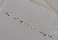 a piece of paper with writing on it that says love you and someone else written in cursive ink