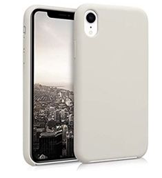 an iphone case is shown with the back cover open and it has a cityscape in