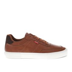 Classic, crisp, and comfortable – these retro-inspired, lowtop sneakers are built to always have your best foot forward. Whether you're meeting the fam for lunch or heading in for a casual day at the office, these men’s sneakers are designed to seamlessly complement any look, from jeans to slacks. The bold rubber outsole adds traction and support while keeping your look polished and crisp. The synthetic leather materials, detailed stitching, and Levi’s iconic red tab logo elevate any outfit with Shoe Warehouse, Closed Toe Shoes, The Fam, Round Toe Heels, Casual Lace, Synthetic Leather, Shoe Shop, Leather Material, Retro Inspired