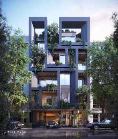 an apartment building with plants growing on the balconies