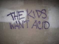 graffiti on the side of a building that says, the kips want acid