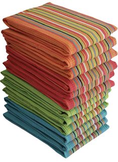 a stack of folded towels sitting on top of each other