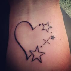 a small heart with stars on the side of its arm and an arrow in the shape of a heart