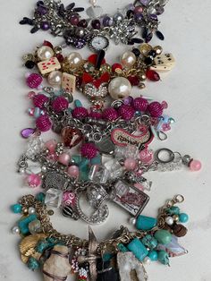 Funky chunky loaded upcycled charm bracelets NEW group August 2024! Please choose your bracelet from the listing below - starting at the bottom of the group picture with bracelet A, and then working upward. If the bracelet is not marked SOLD - it is available.  Purchase the number of bracelets you would like - then immediately send me a message with your selection(s) so I can mark them sold.  Then I will mail your purchase out to you! Starting with the bottom of the group picture of the bracelet Cheap Vintage Bracelets With Charms, Chunky Charm Bracelet, Funky Bracelet, Group Picture, Chunky Bracelets, Upcycled Vintage, Girly Girl, Charm Bracelets, Cute Jewelry