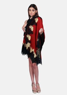 Crafted from a luxurious blend of wool and silk, this maroon scarf offers cozy warmth and sophistication. The stunning intertwined double-colored floral lace border in black and dark gold creates a captivating visual contrast. Style yourself with this gorgeous accessory that epitomizes opulence whilst adding a touch of refined beauty to any evening out. Luxury Festive Shawl, Elegant Red Shawl Dupatta, Elegant Red Dupatta Shawl, Elegant Red Scarf For Festive Season, Elegant Red Festive Scarf, Elegant Red Pashmina Scarf, Black Formal Shawl For Festive Occasions, Elegant Winter Dupatta Scarf, Elegant Black Festive Shawl