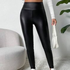 Are you looking for pants that fit right into your everyday look? Then these Women's Solid Thermal Lined Pants are the best bet. The long length and loose fit provide a silhouette, perfect for both lounging at home and stepping out with confidence. The thermal lining adds an extra layer of warmth, ensuring you stay snug and cozy during cooler seasons. Specifications: Thermal-Lined PU Leather: Designed with a thermal lining, these PU leather pants provide both style and warmth, perfect for colder High Stretch Solid Pants For Fall, High Stretch Solid Color Pants For Fall, Black Non-stretch Leggings With Elastic Waistband, Black Leggings With Elastic Waistband, Casual Straight Leggings For Fall, Fall Casual Straight Leggings, Black Leggings With Elastic Waistband For Fall, High Stretch Black Bottoms, Fall Black Leggings With Elastic Waistband