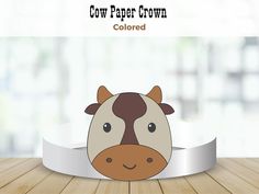 a cow paper crown is shown on a table