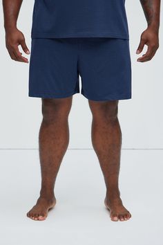 Available In Navy, Black, Brown, Grey and Khaki Elastic Waist Side Pockets Pair With "Essential Lounge Tank" Pair With "Essential Lounge Tee" Pair With "Essential Lounge Sleeveless Muscle Tee" Pair With "Essential Lounge Long Sleeve Tee" 48% Cotton, 47% Modal, 5% Spandex Final Sale. Imported | Mens Essential Modal Lounge Shorts in Navy Blue size Small by Fashion Nova Mens Sleepwear, Muscle Tee, Navy Fashion, Lounge Shorts, Mens Essentials, Muscle Tees, Swim Shorts, Long Sleeve Tee, Clothes For Sale