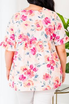 Grab this beauty while you still have a chance! This top features a lovely floral pattern and a pretty peach coral color that is sure to stand out! The flowy fit makes it perfect for a casual day out! 100% Polyester Feminine Peach Tops For Beach, Feminine Peach Tops For The Beach, Casual Peach Blouse For Brunch, Peach Feminine Blouse For Day Out, Feminine Peach Blouse For Day Out, Peach Blouse For Beach, Spring Season, Peach Blouse For Beach In Spring, Peach Blouse For Spring Beach Occasions, Peach V-neck Blouse For Spring