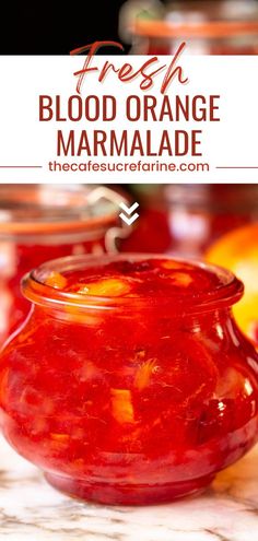 fresh blood orange marmalade in a glass jar on a marble countertop with text overlay