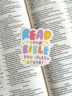 an open book with the words read your bible on it